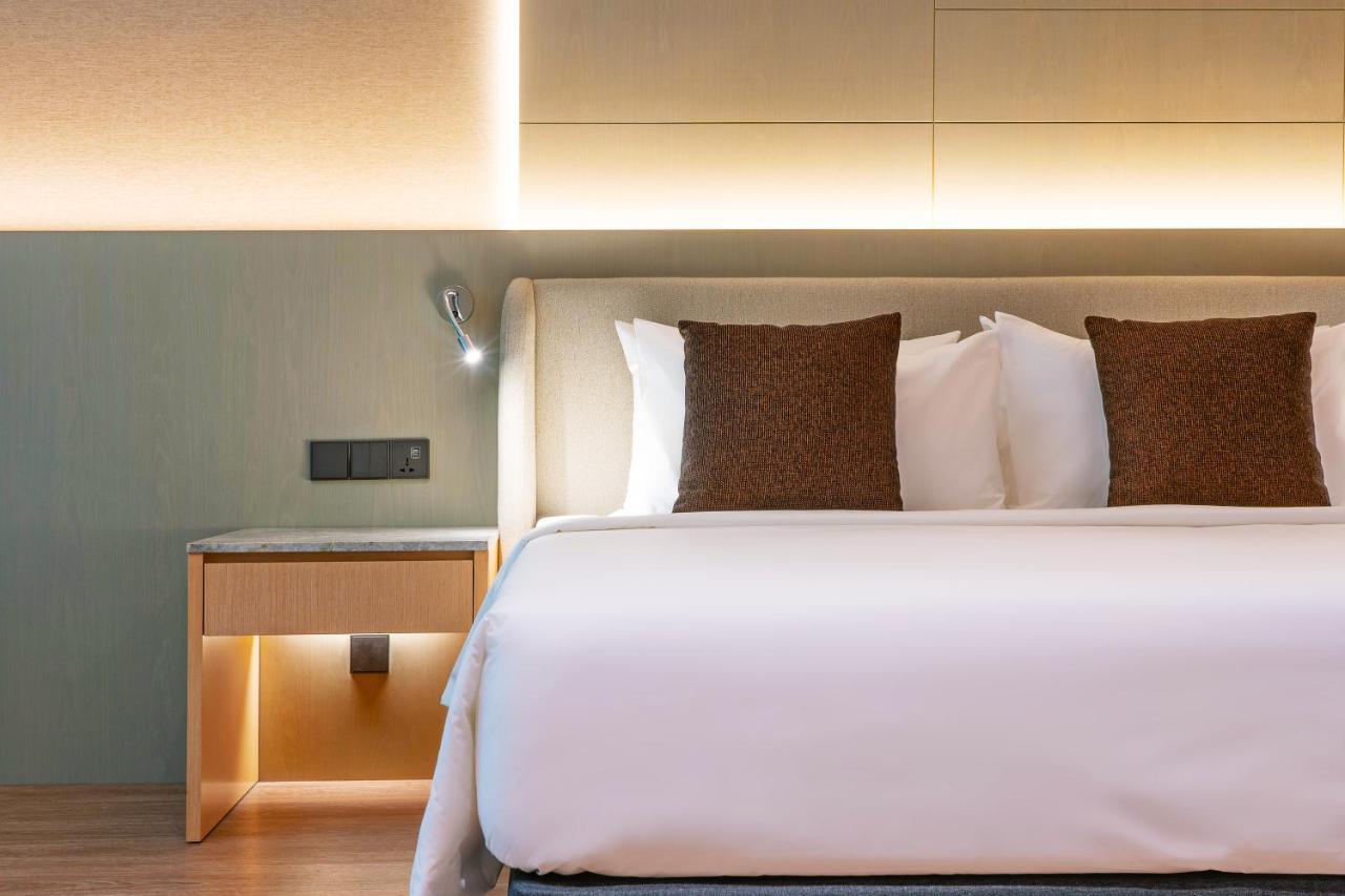 M World Hotel Formerly Known As Avante Hotel Petaling Dzsaja Kültér fotó A bed in a hotel room